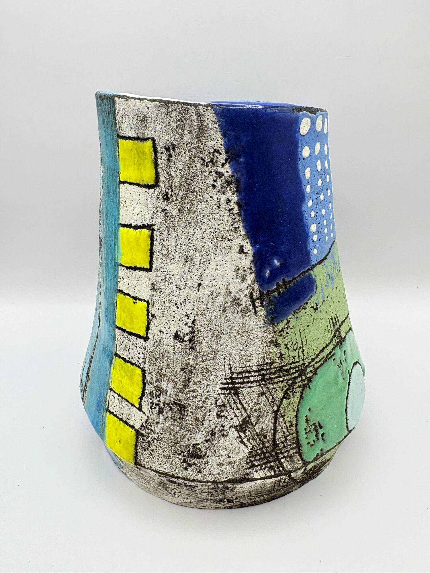 blue vessel with green circle - Image 6