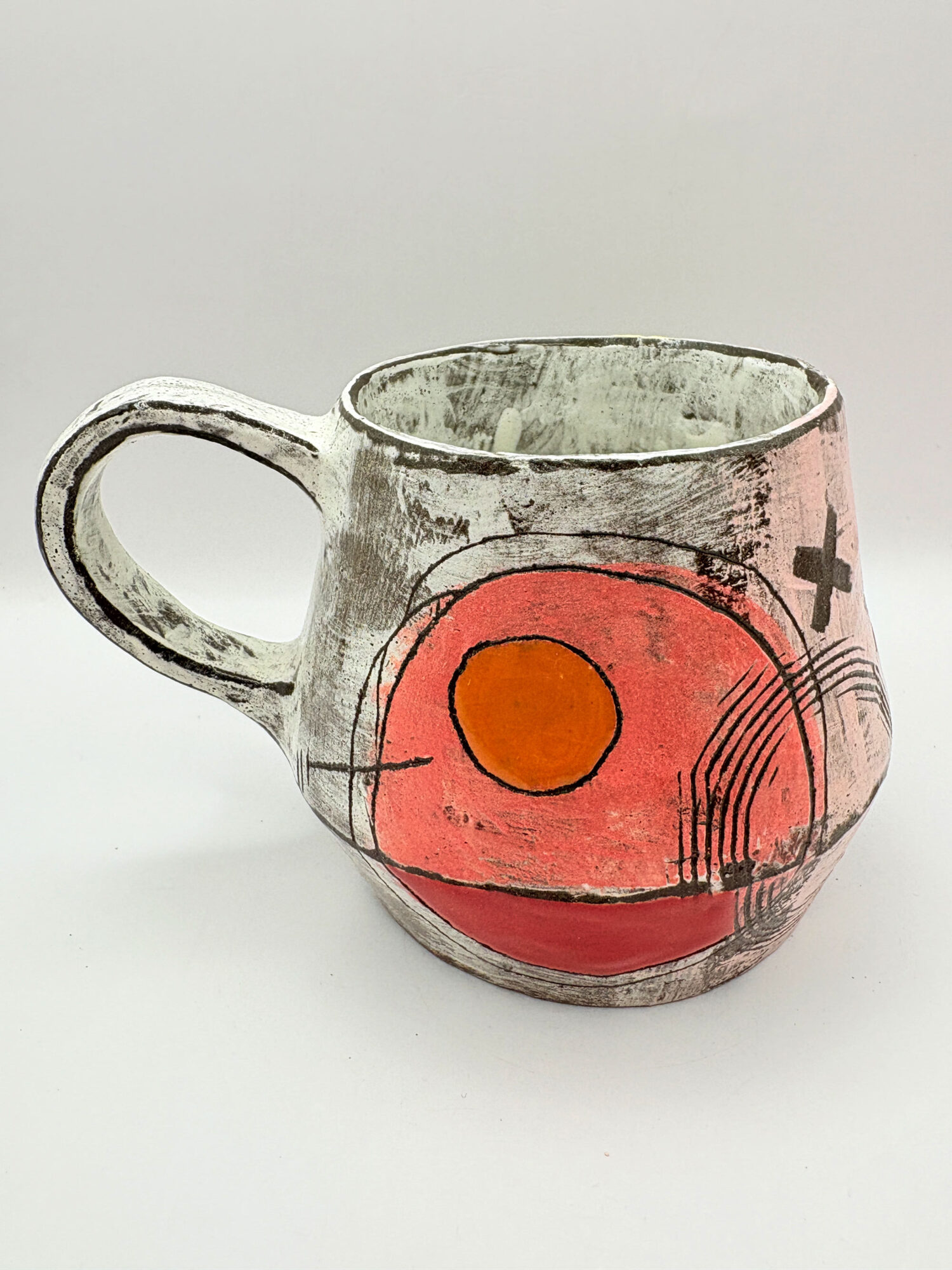 pink and green mug